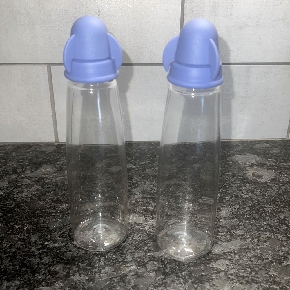 7 inch tall oil and vinegar containers. New without tags. Vintage Tupper…